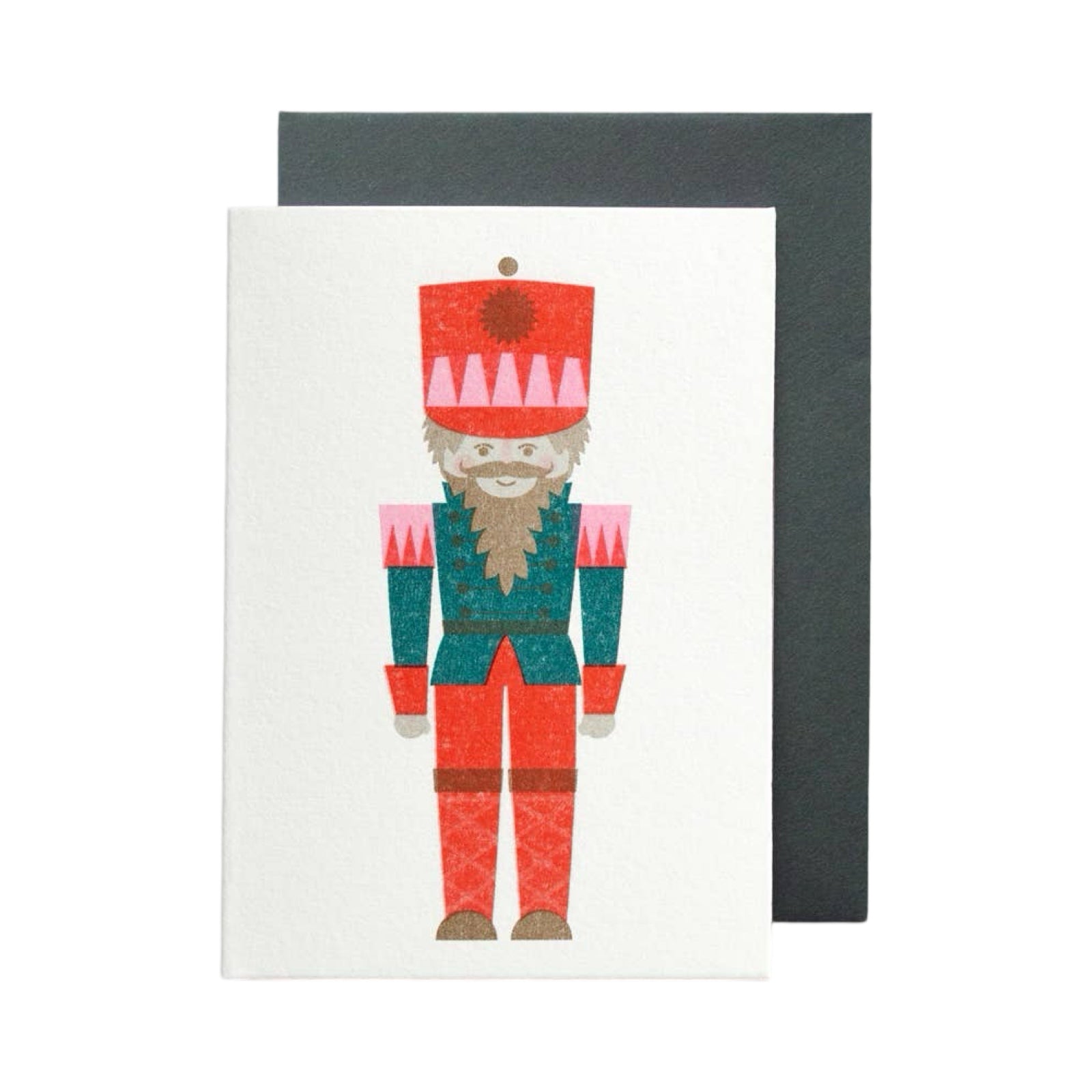 Mini Christmas card of a nutcraker in green, pink and red