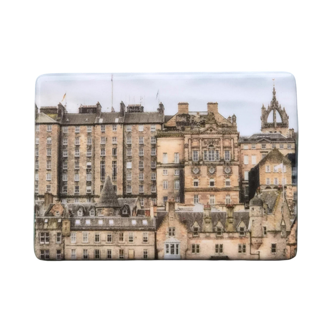 A ceramic magnet showing a view of Edinburgh's Old Town.