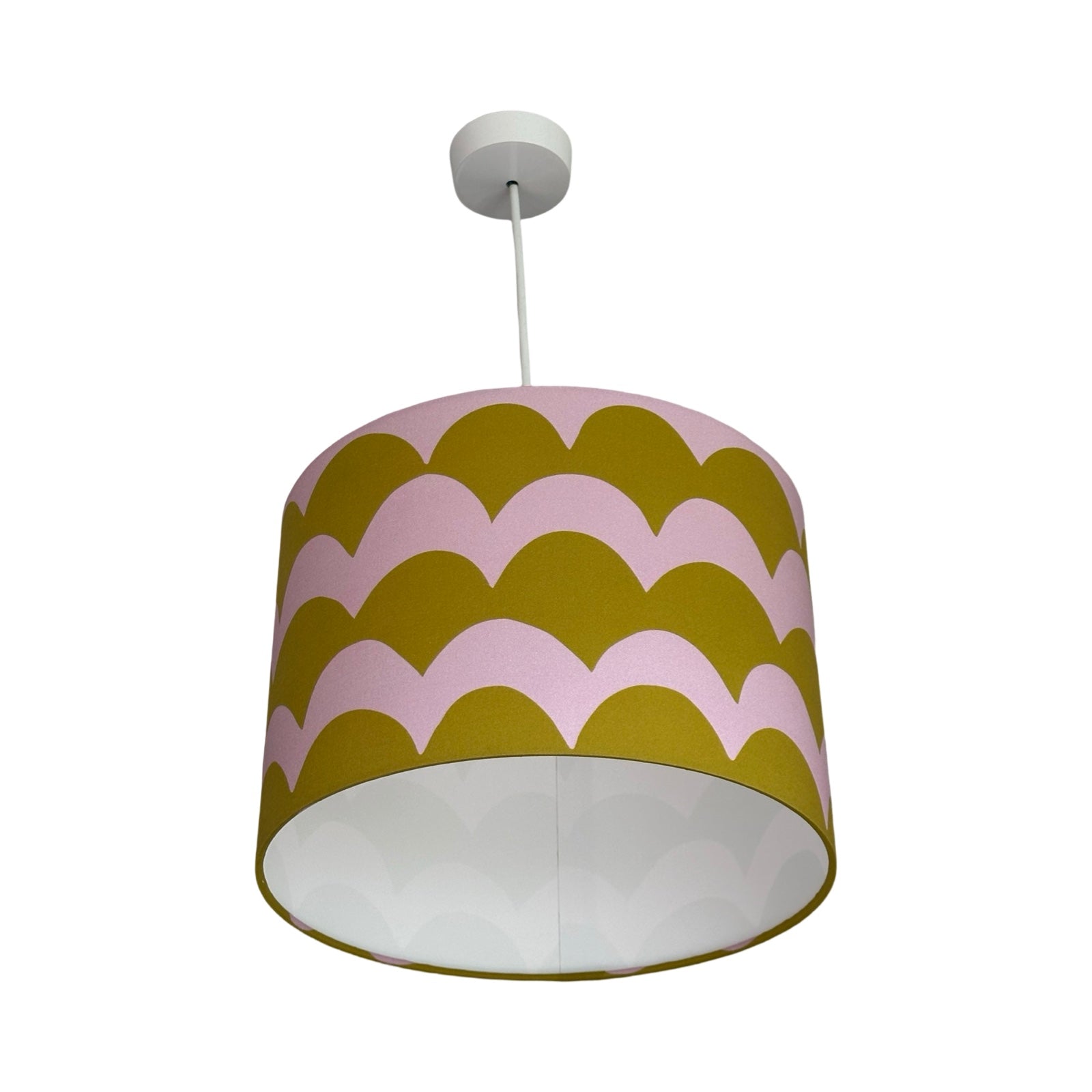 A drum lampshade in olive and lilac cotton with a wave design.