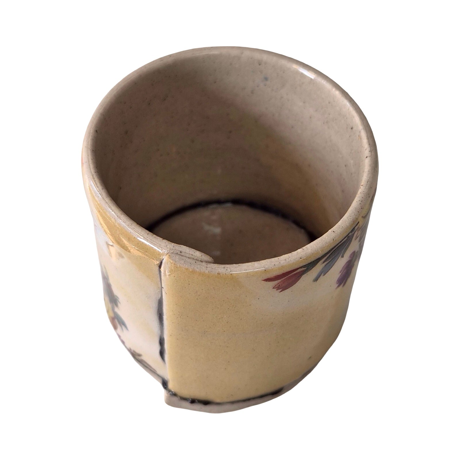 Ceramic planter with a unique design on a white background.