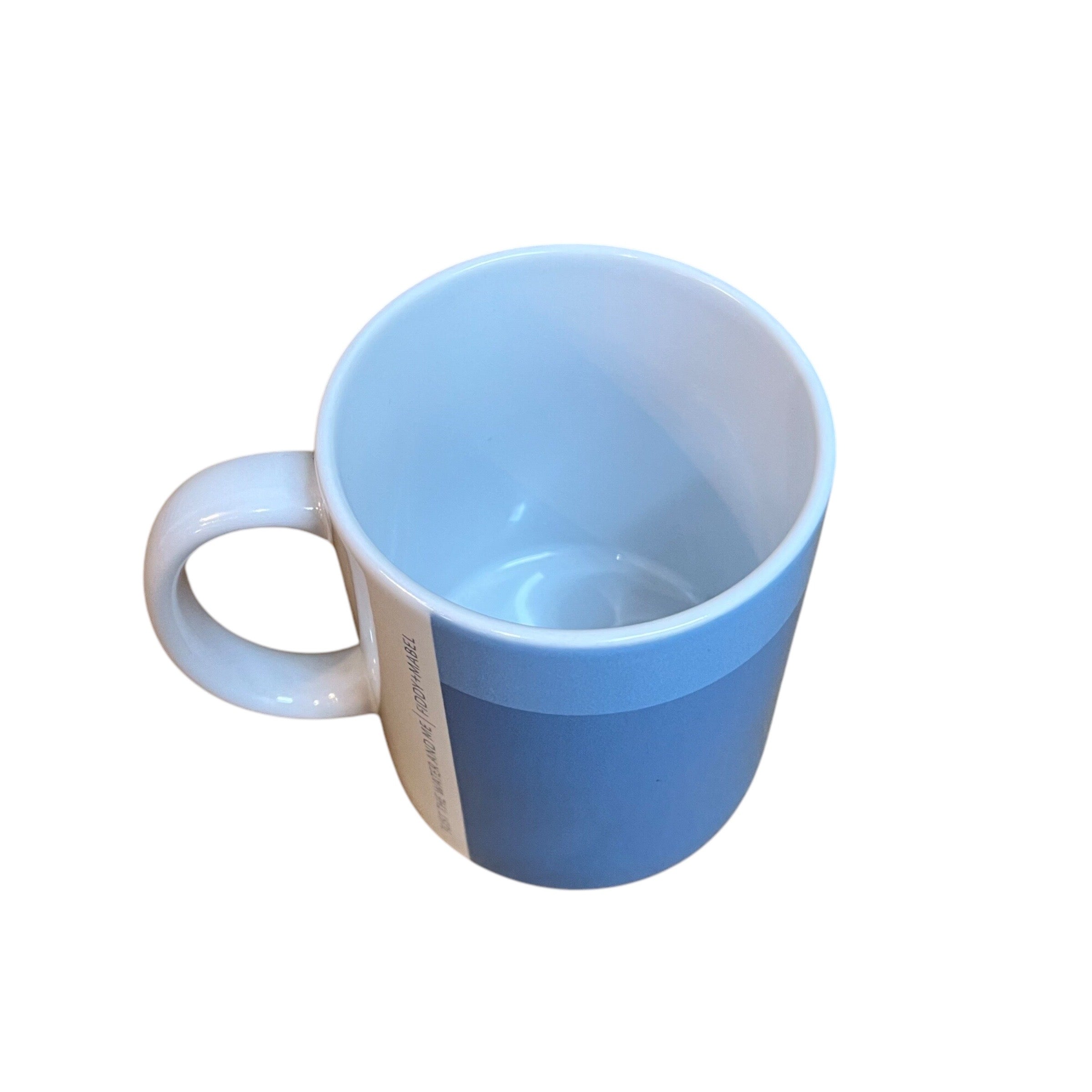 Mug featuring a paddle boarder out in the sea on their board and the text "just the water and me". This mug holds 10oz and is dishwasher safe.