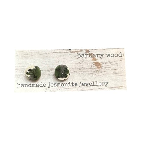 Round stud earrings in a green, grey, black and white paint design with silver posts.