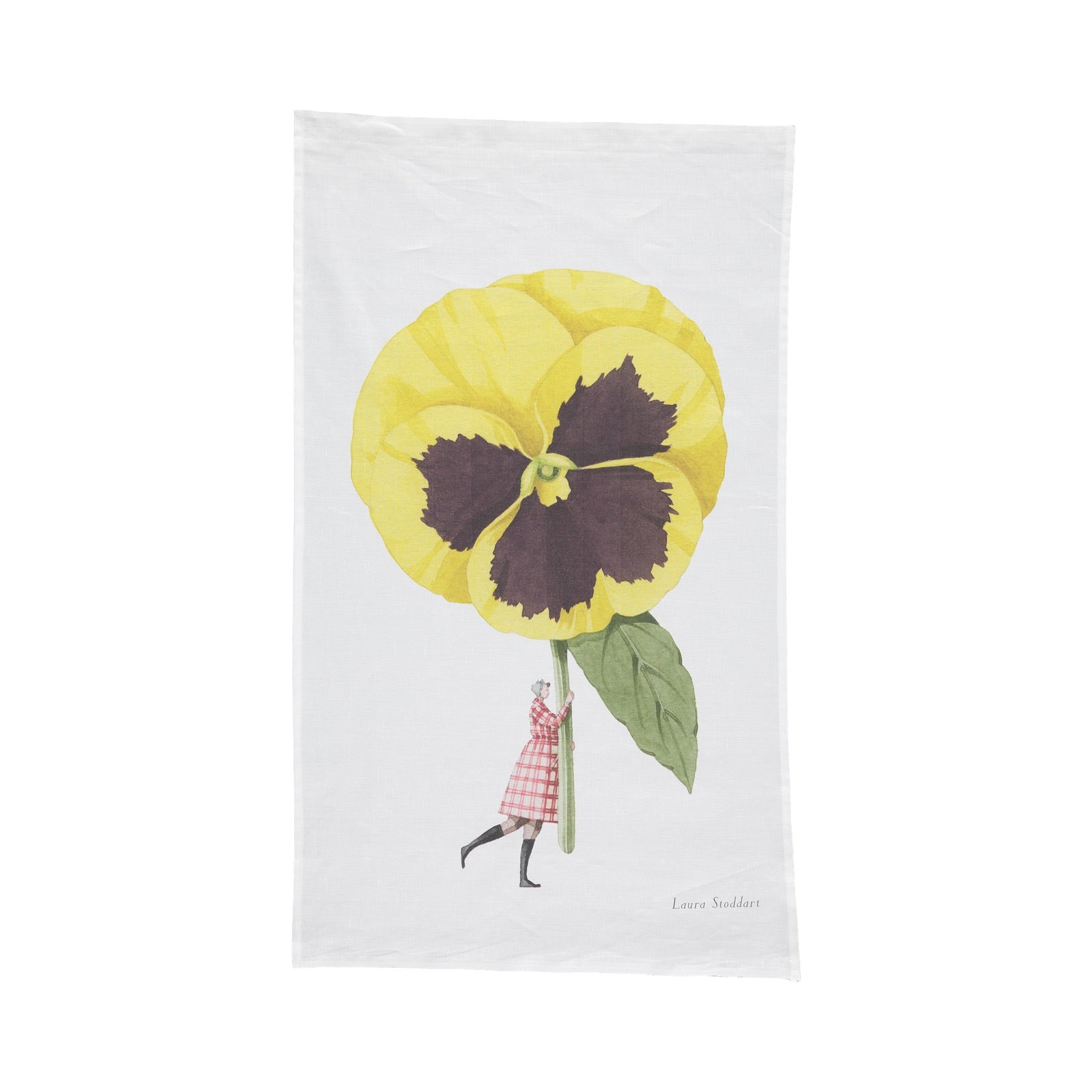 Floral tea towel featuring an illustration of a lady holding a giant yellow pansy.