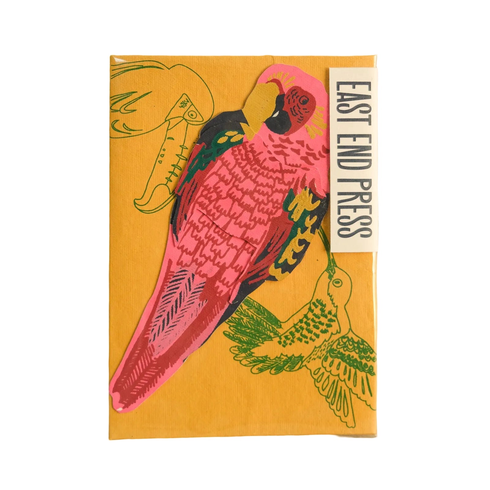 Hand-printed pink parrot-shaped pop-up card packaged with a yellow envelope.