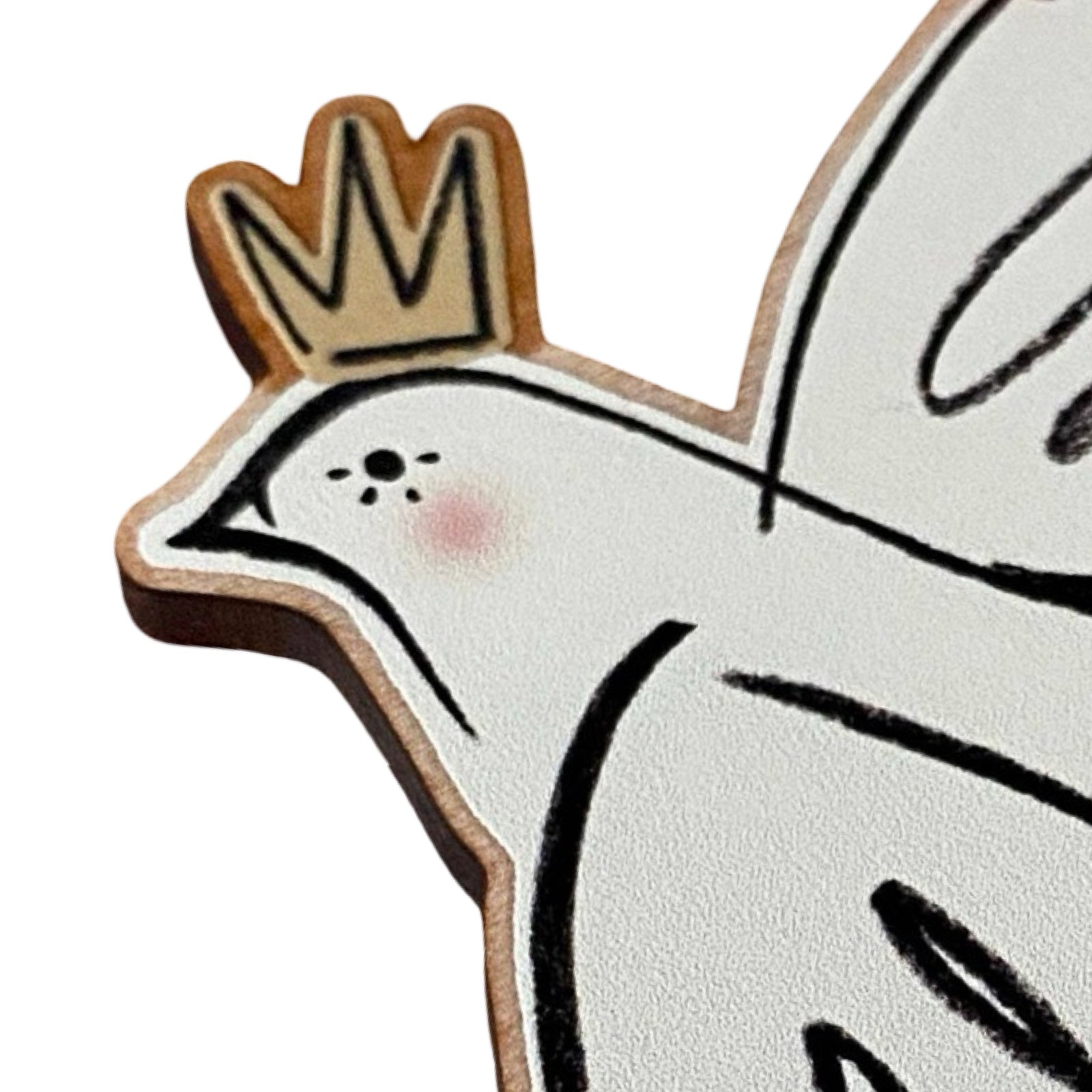 Decorative dove decoration wearing a crown on a white background.