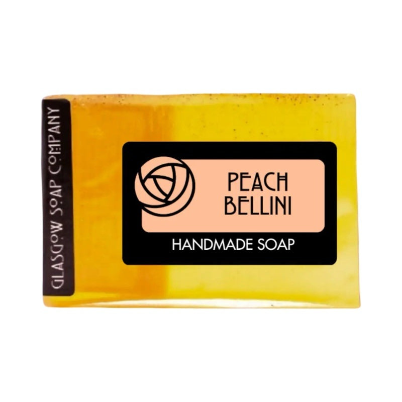 A bar of pale orange peach bellini fragranced soap.