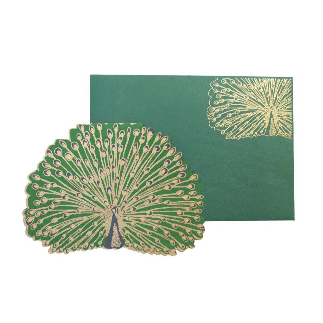 Green peacock-shaped card with gold detail and a green envelope.