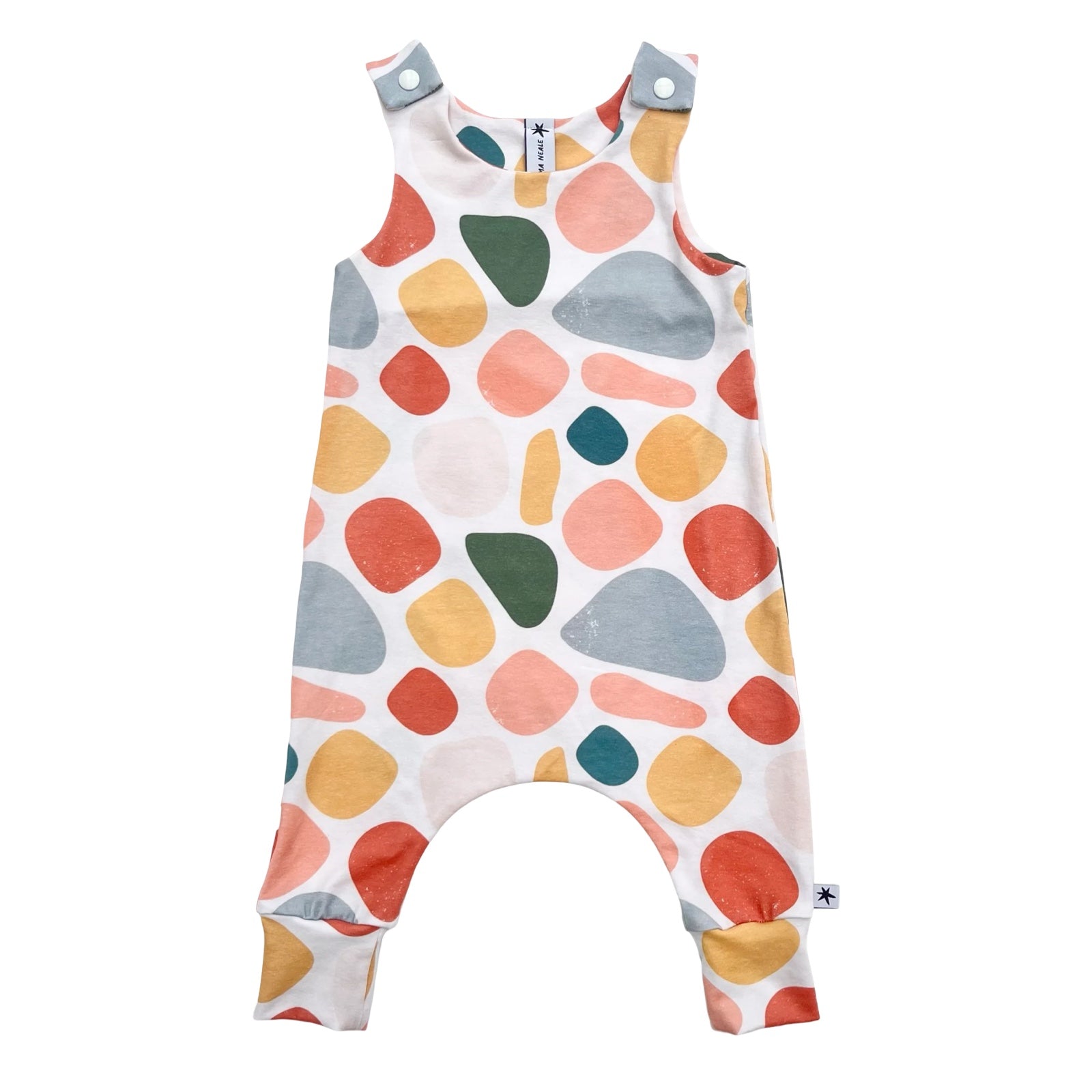 Colourful baby romper with abstract pattern on a white background.