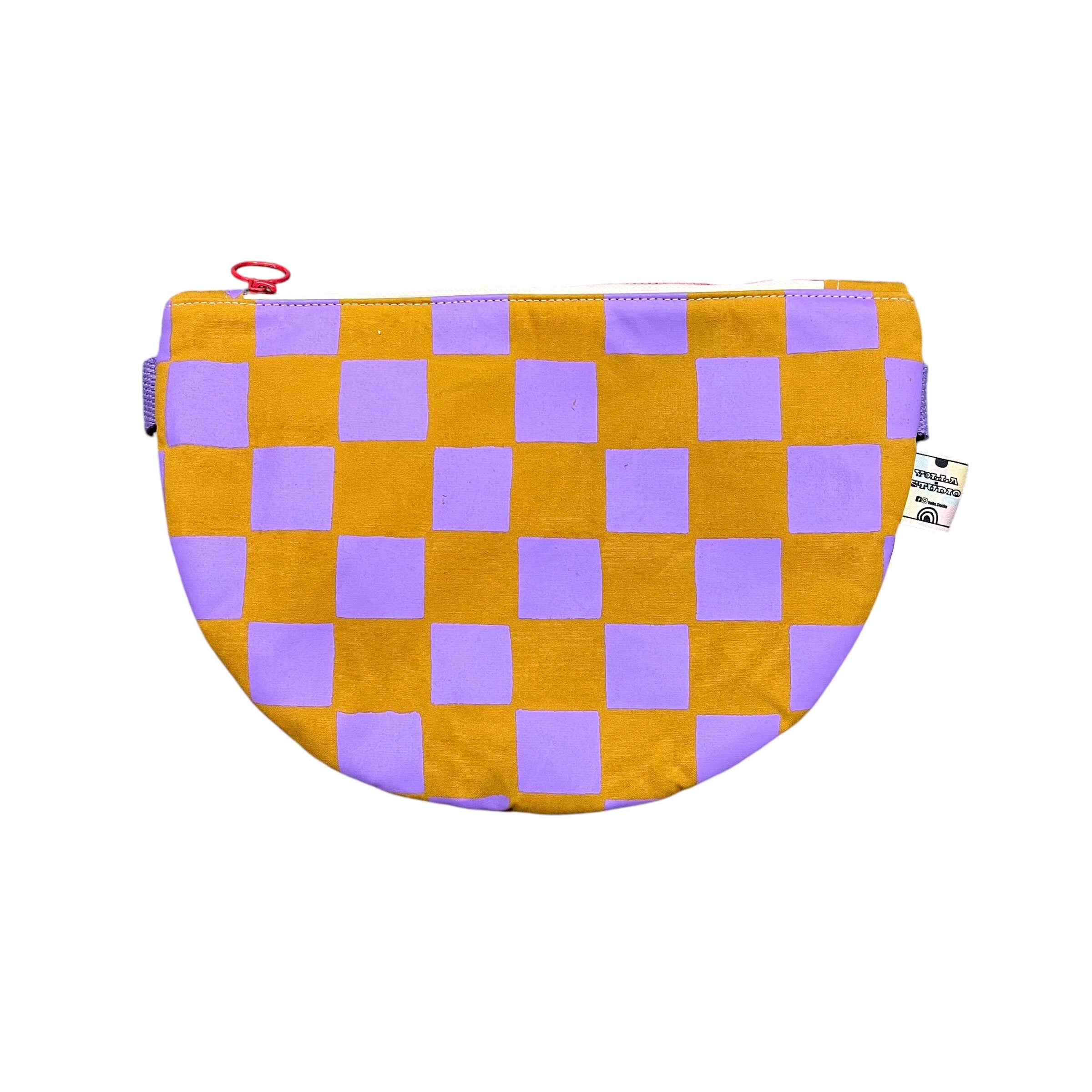 Purple and orange checked cross body bag.