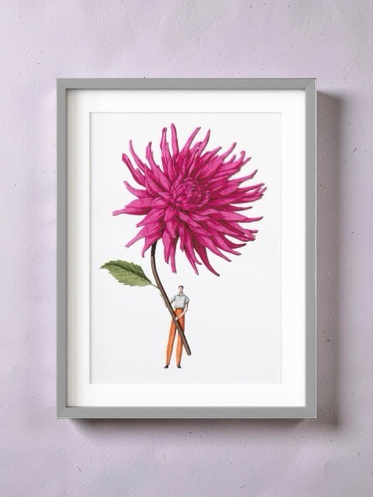 Framed artwork of a pink flower with a small figure holding it against a light purple background.