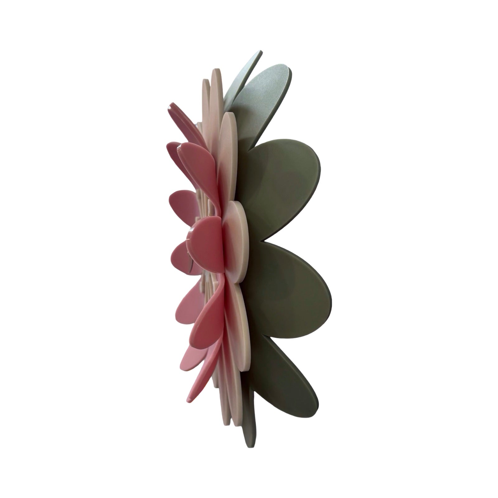 Decorative wall piece with pink, green, and beige leaves on a white background.