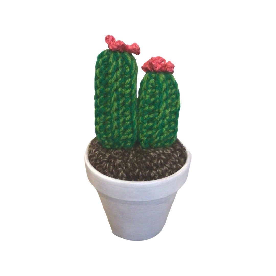 Handmade double stem crochet cactus with Pink flowers in a white painted terracotta pot.