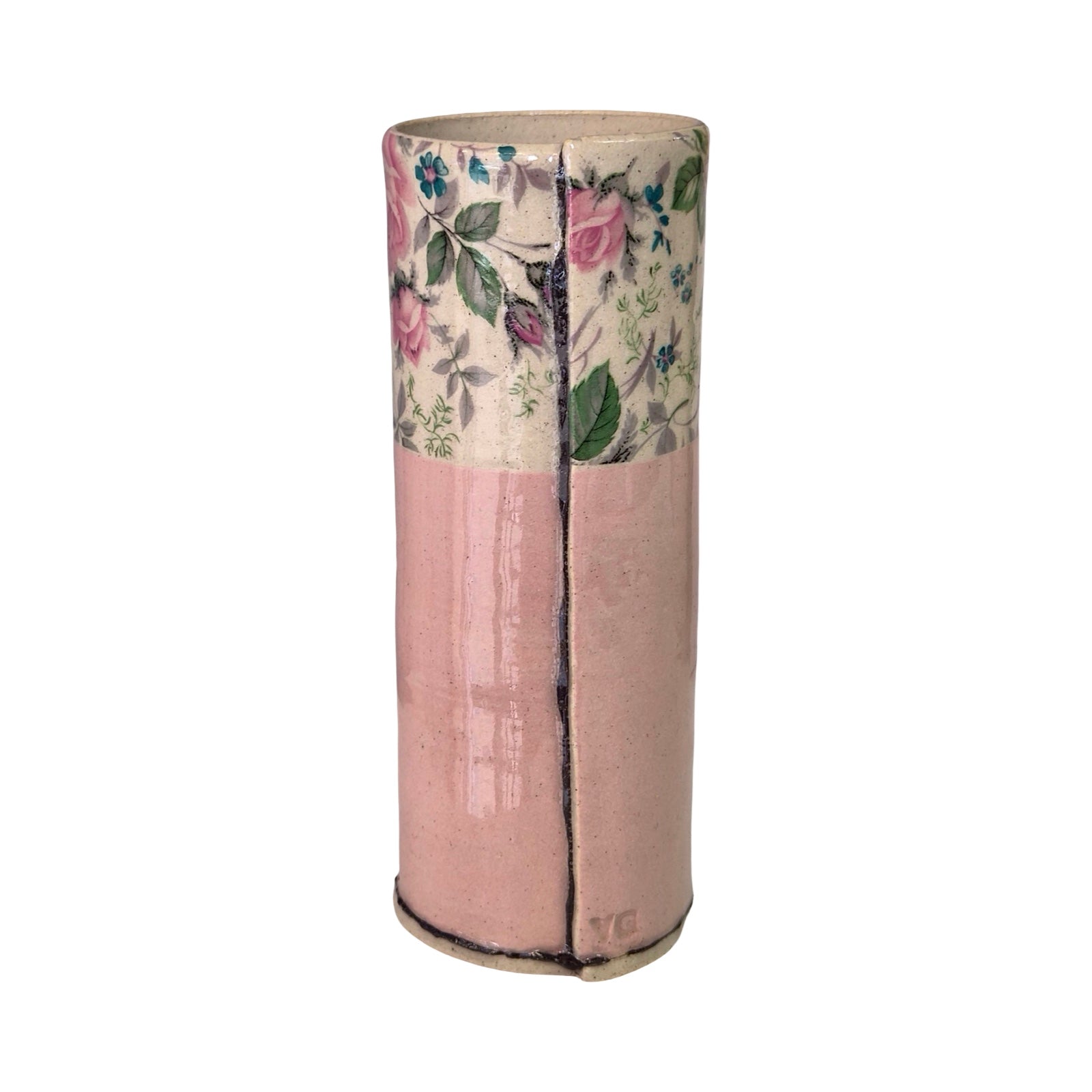 Cylindrical vase with floral design on top and pink base on a white background.