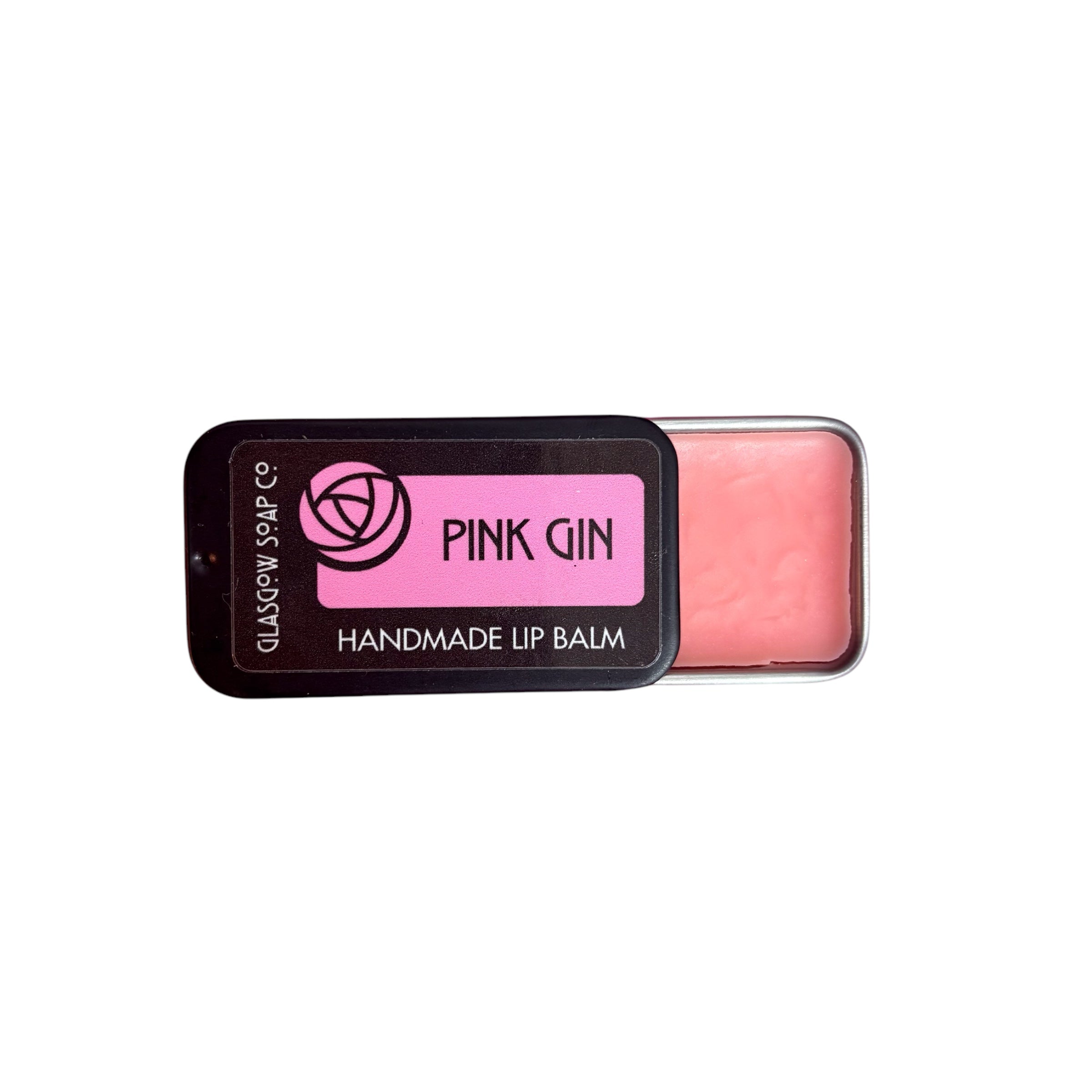 A small black tin of raspberry flavoured pink gin lip balm, half open.