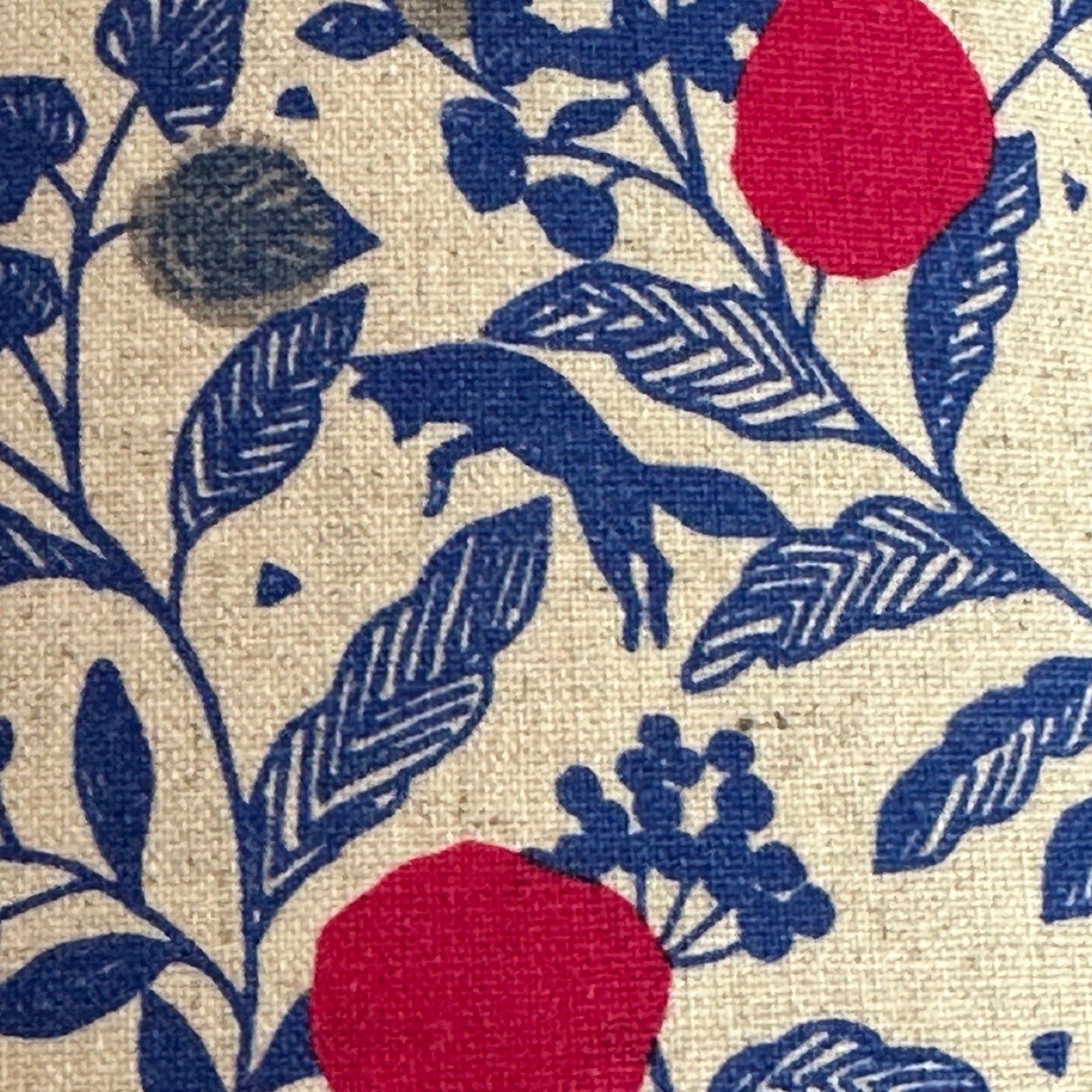 Cream cotton fabric with pink plums, grey circles, blue foliage and blue foxes.