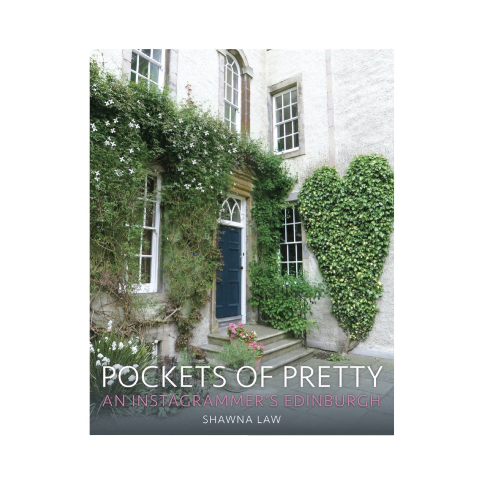 The front cover of Pockets of Pretty showing a house with ivy growing up the outside and shaped into a love heart on one wall.