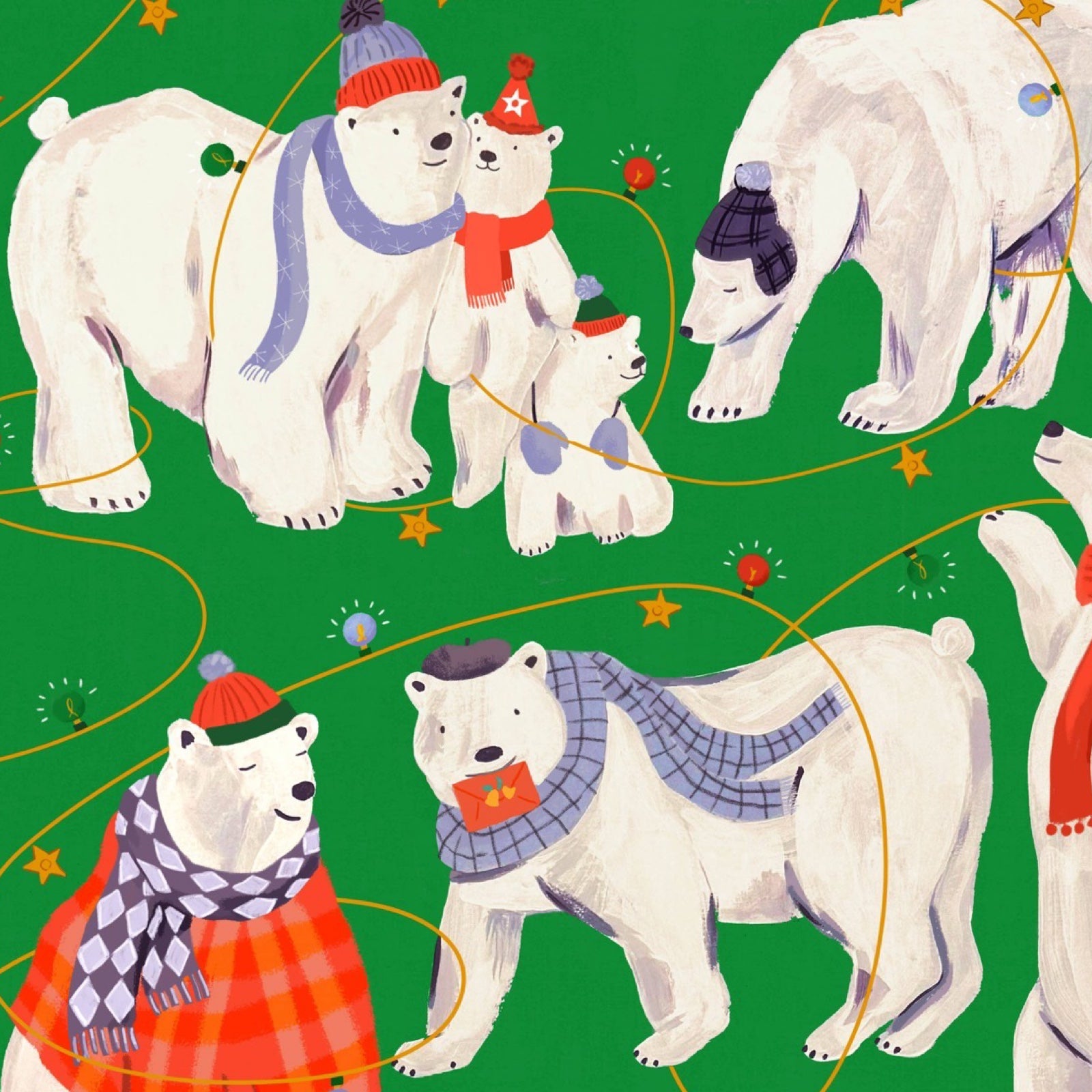 Christmas wrapping paper featuring polar bears in their winter woollies.