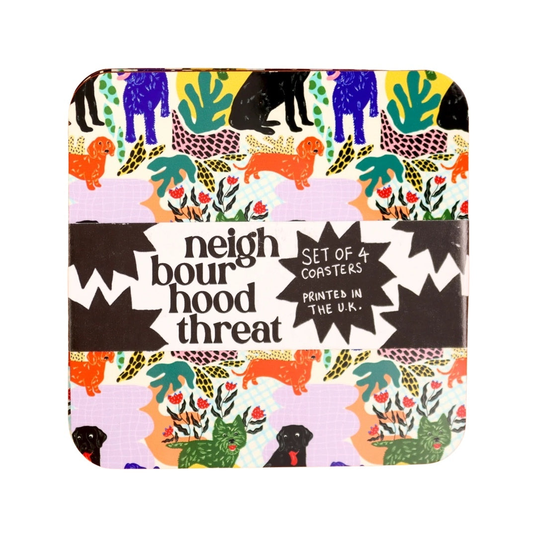 Set of 4 adorable dog coasters, featuring black labradors, orange dachshunds and green scottie dogs with green leaves and a lilac background.
