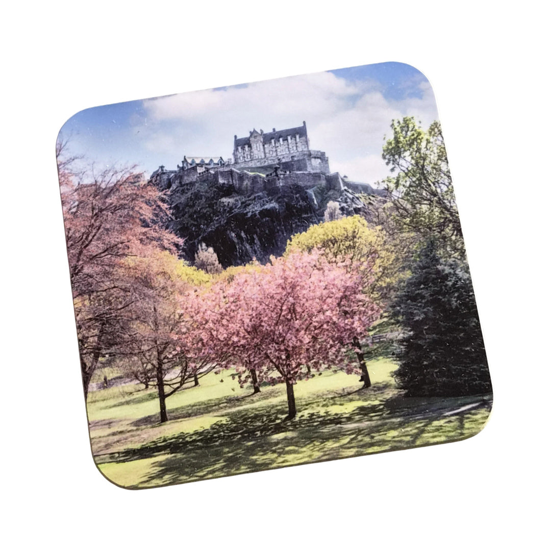 An image of a coaster with Edinburgh Castle and Princes Street Gardens on it.