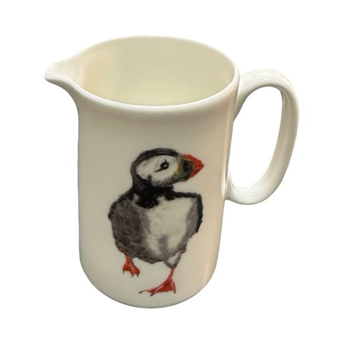 White fine-bone china milk jug featuring an illustration of a large puffin in the centre of the jug.