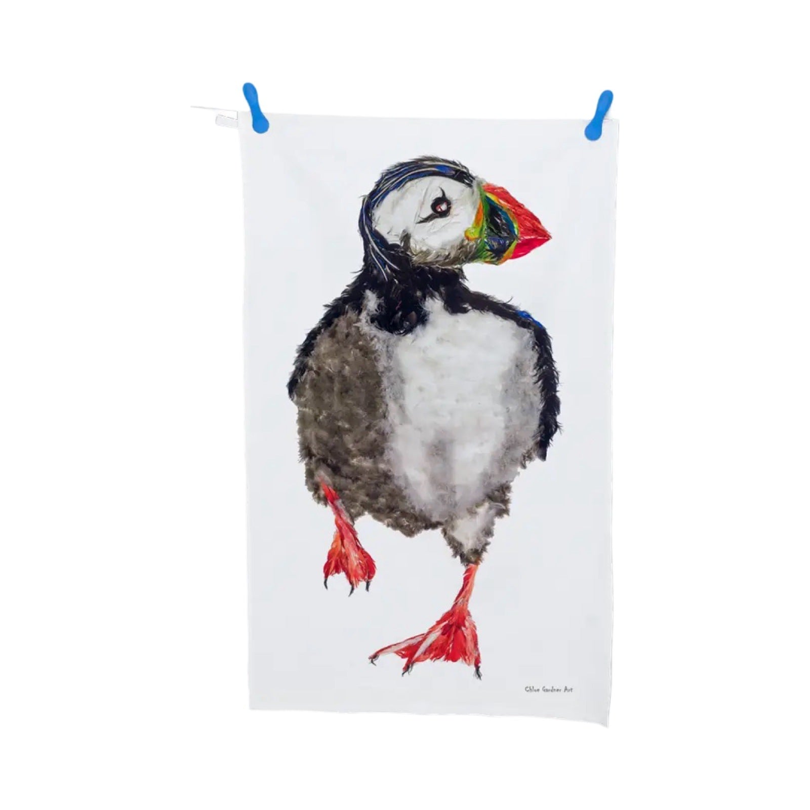 This white tea towel features an illustration of a large puffin.