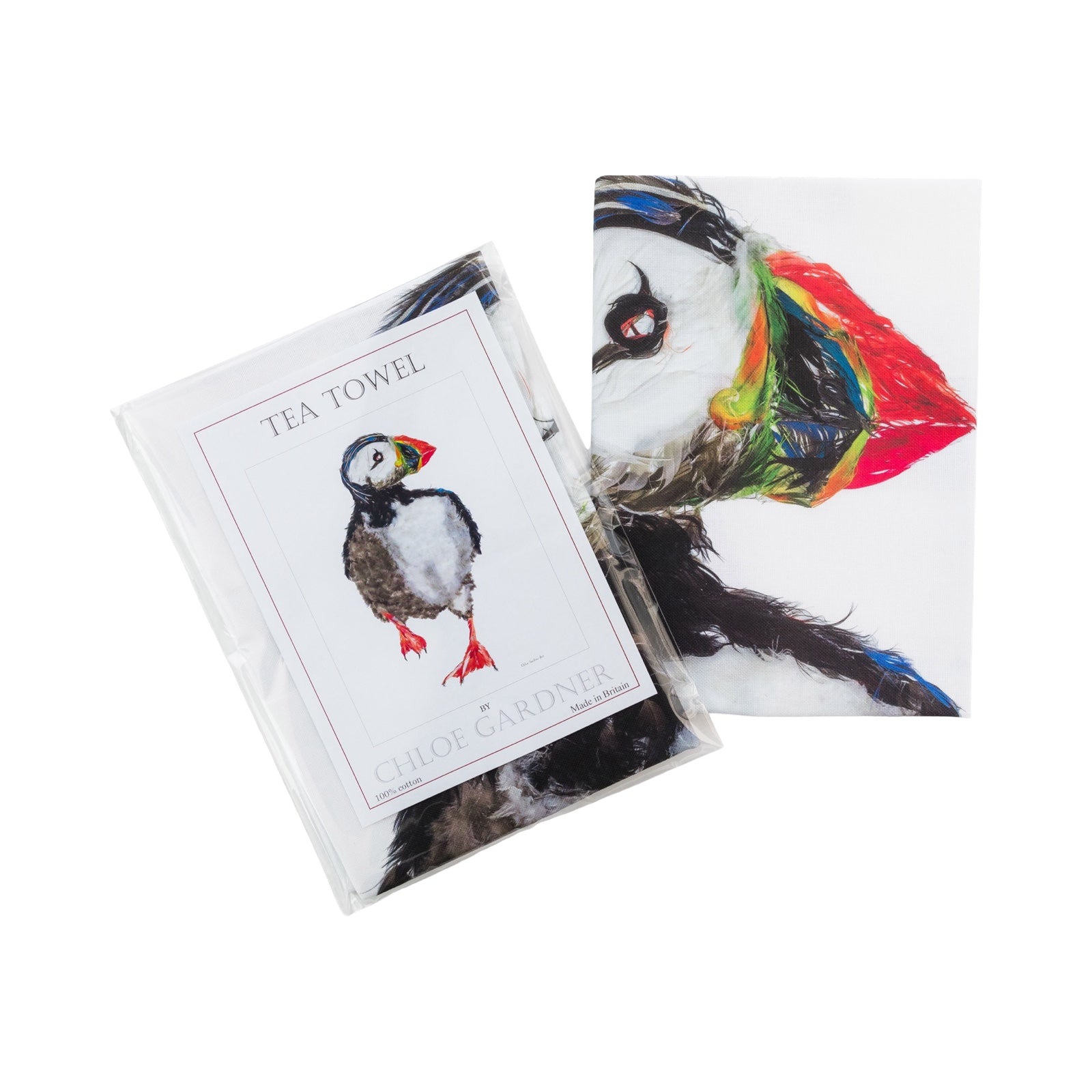 This white tea towel features an illustration of a large puffin.