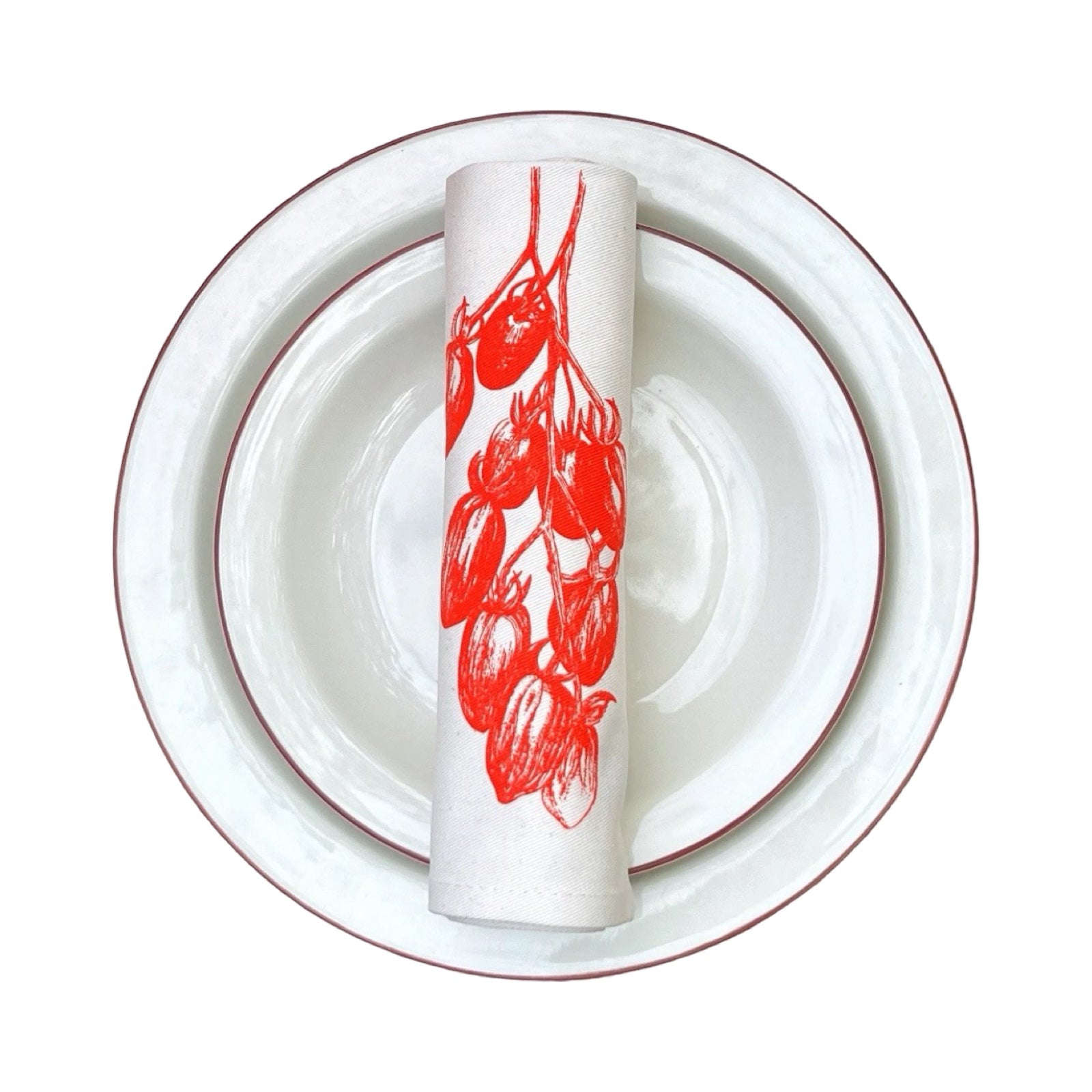 Handmade screen-printed cotton serviettes featuring original illustrations of tomato vines.