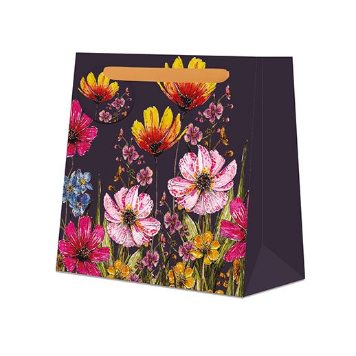 Gift bag with colourful floral design on a white background.