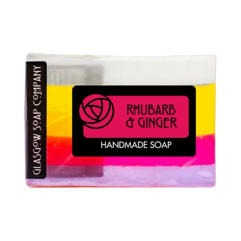 A bar of white, yellow and pink rhubarb and ginger handmade soap.