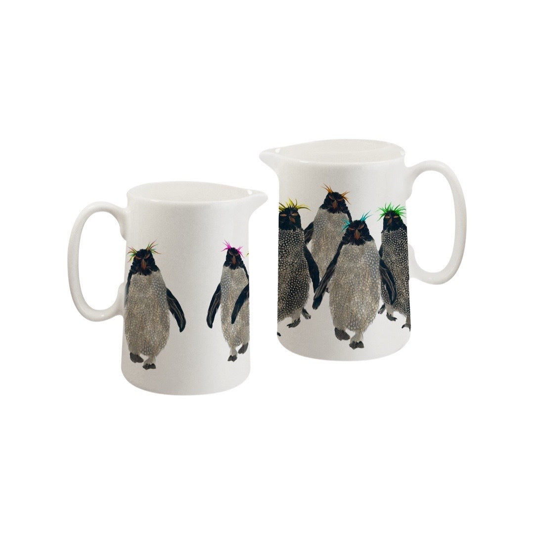 White fine-bone china milk jug featuring an illustration of a waddle of rockhopper penguins.