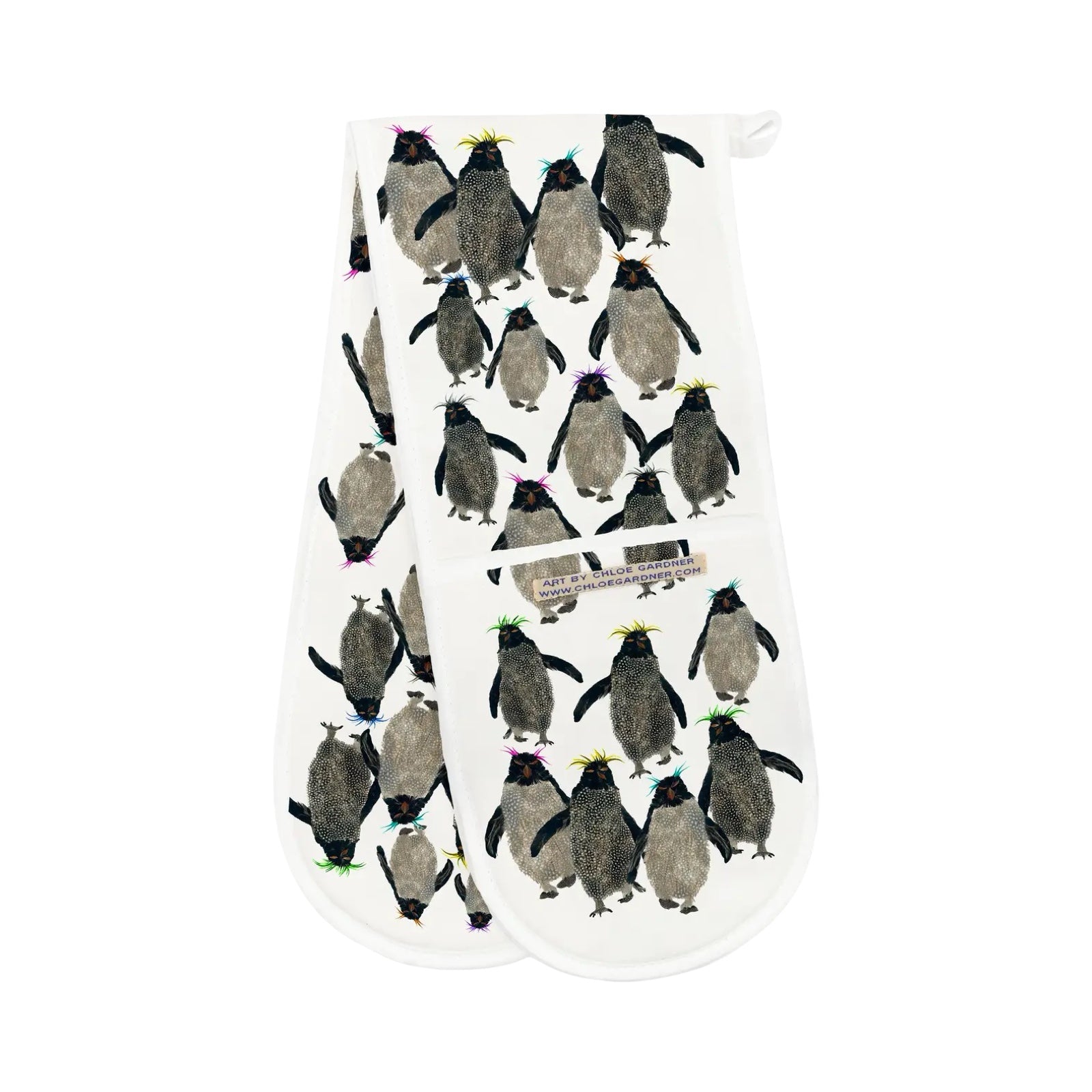 Oven mitt with penguin pattern on a white background.