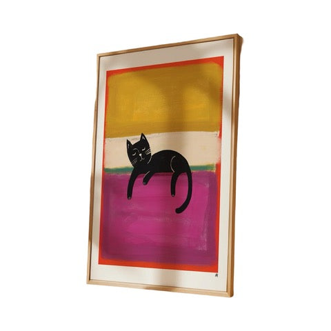 Cat print of a black cat lying on a raspberry pink block inspired by the famous artist Mark Rothko.