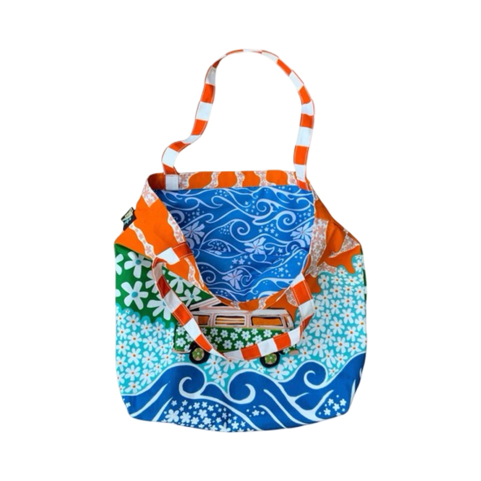 A fabulous, bright and colourful tote bag featuring a pink campervan covered in green daisies on a meadow of blue daisies, a large orange sun and blue waves.