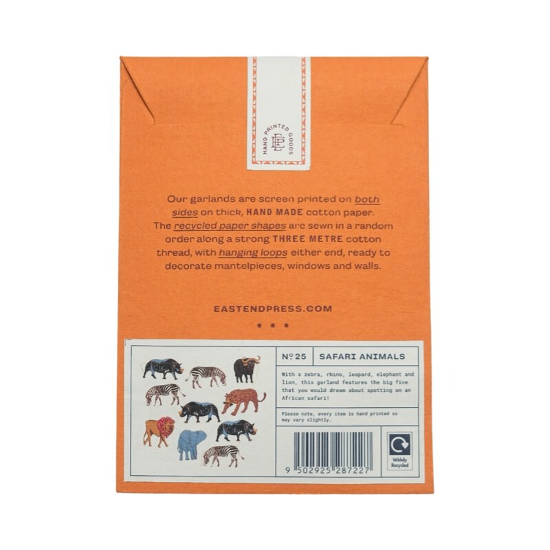 The back of an orange paper packet holding a safari paper garland.