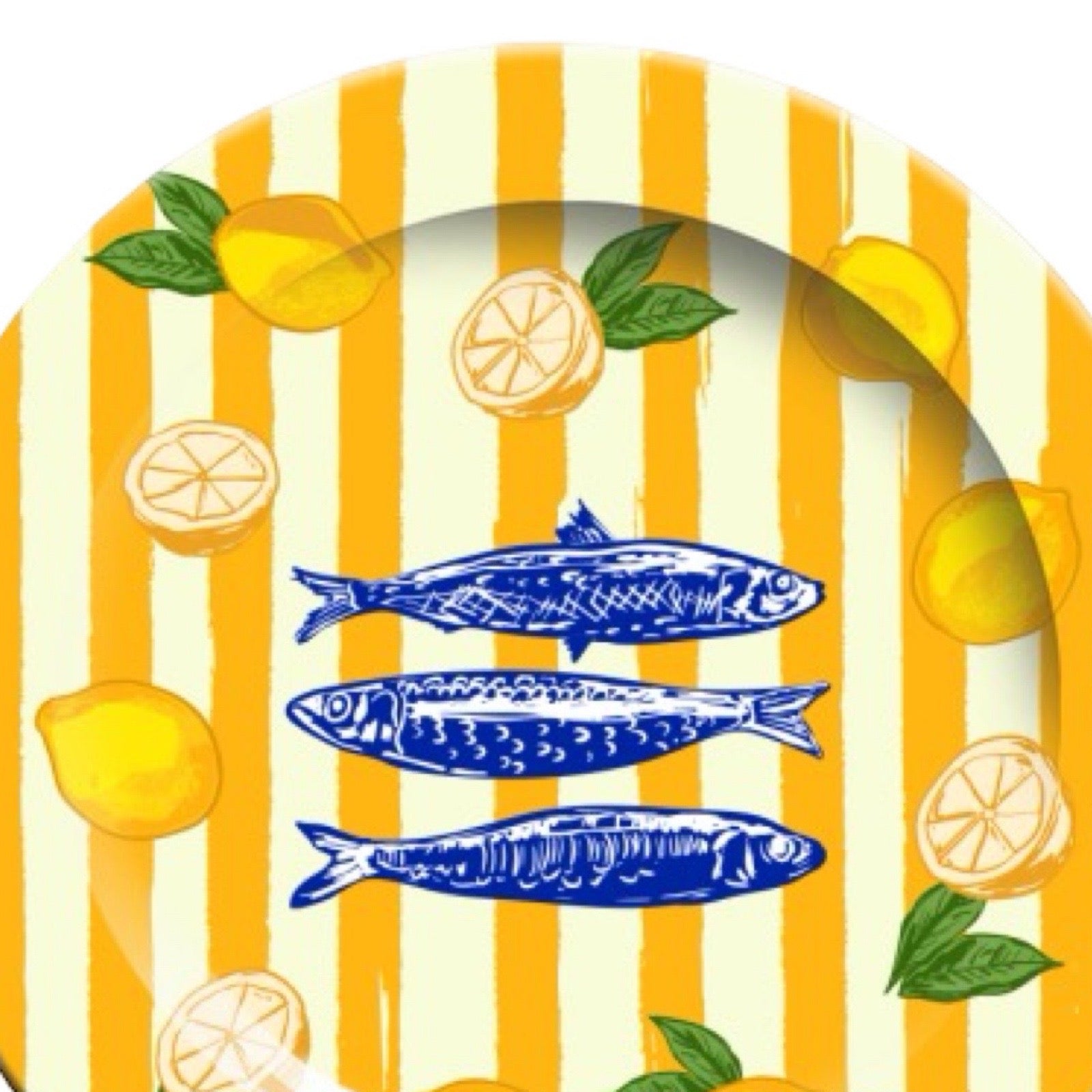 Decorative plate with yellow and white striped pattern, blue fish, and lemons on a white background.