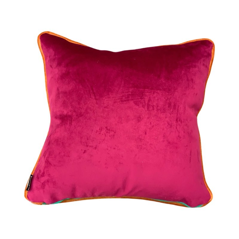 A pink velvet cushion back.