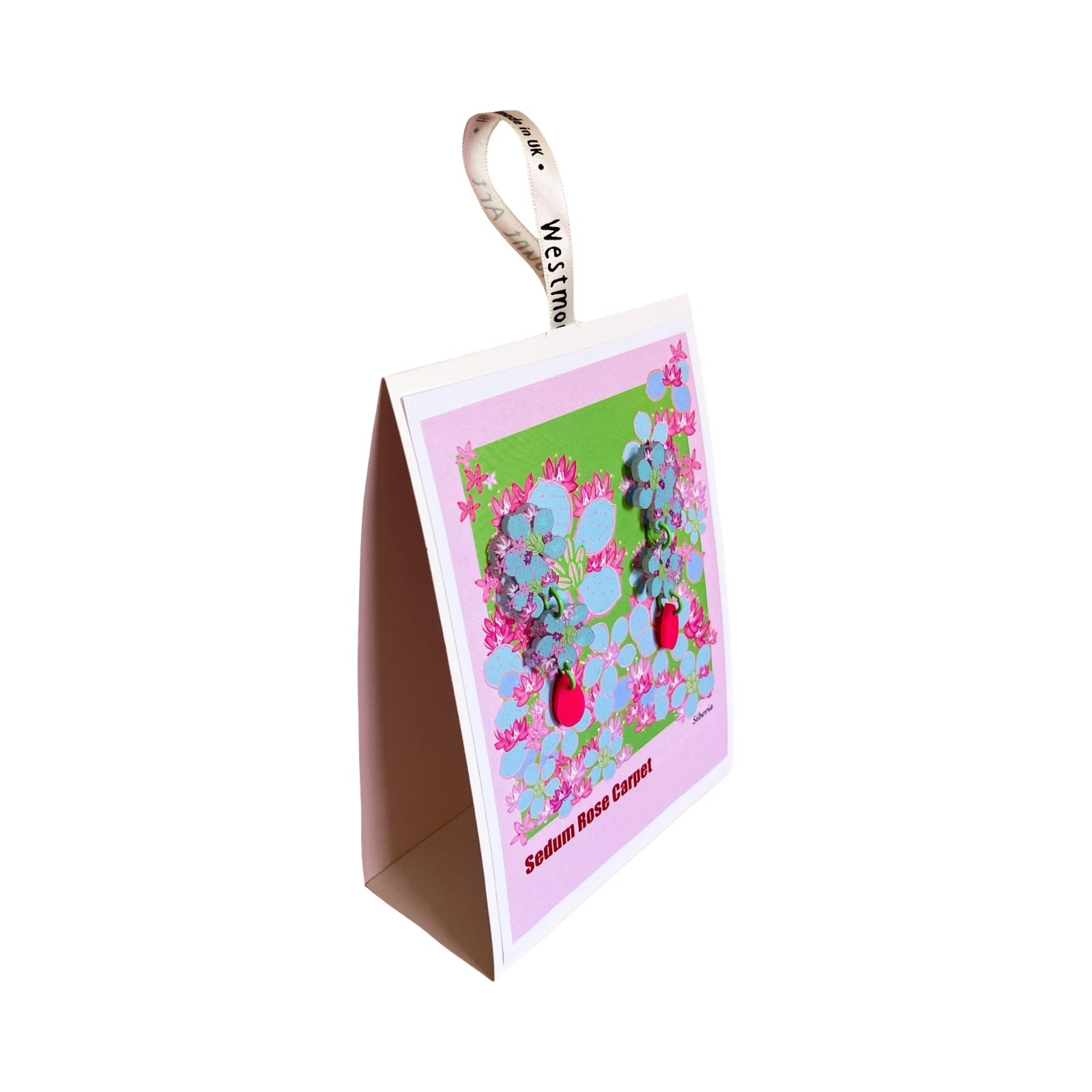 Botanical earrings made from acrylic and has silver earring posts.