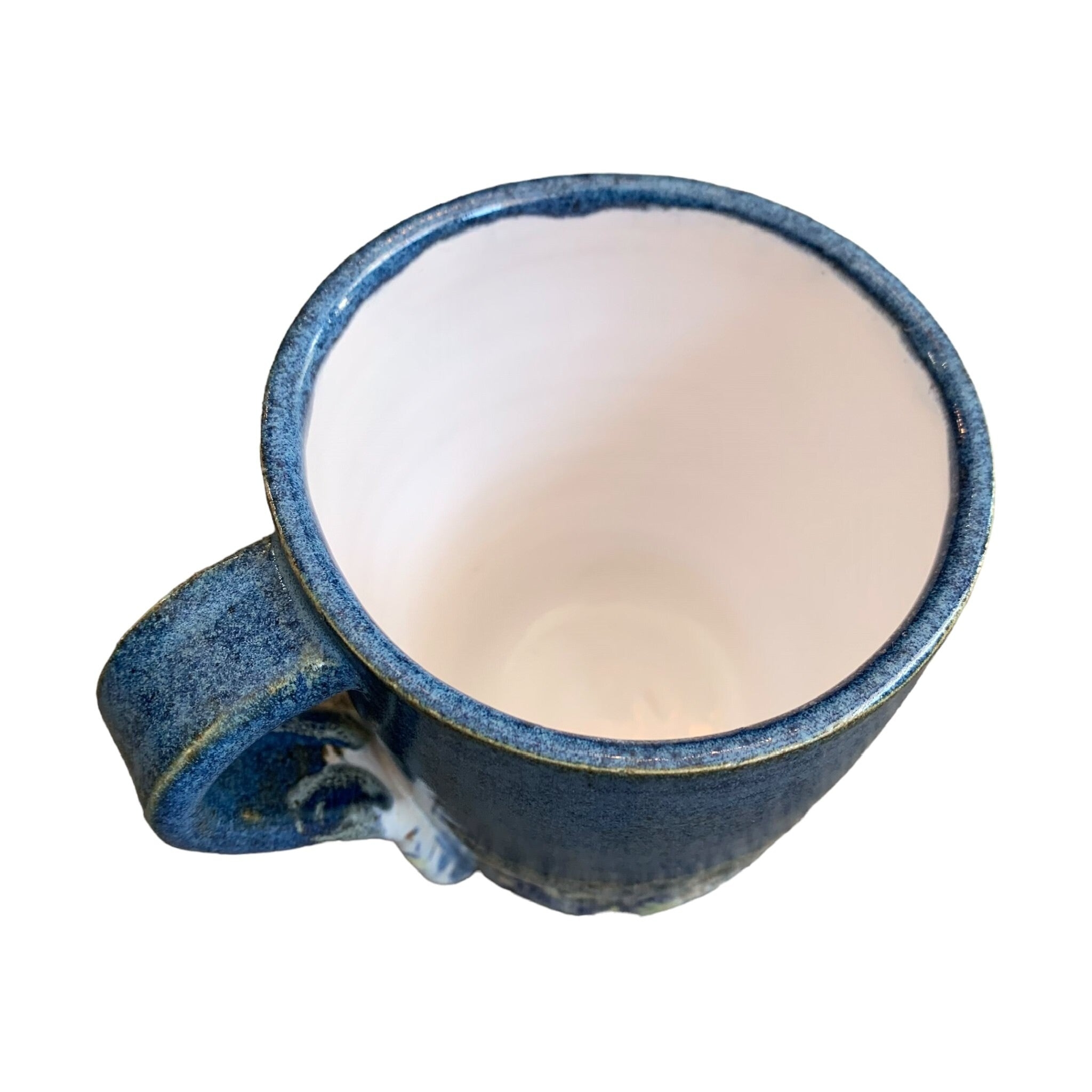 The top of a navy shoreline mug.