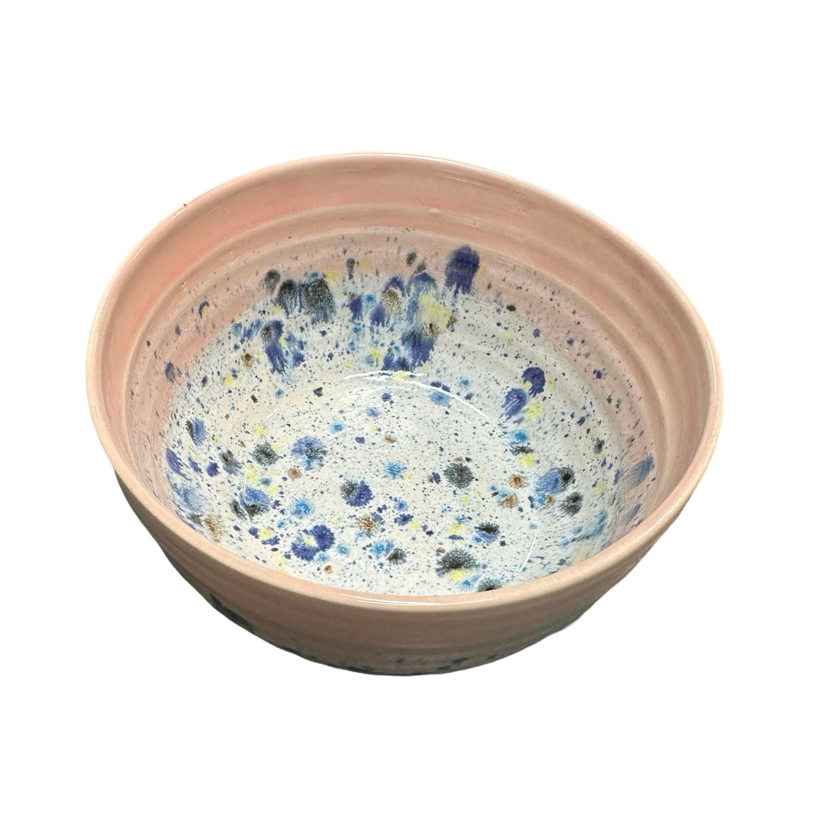 Deep ceramic ramen bowl in pink and white with colour splash design.