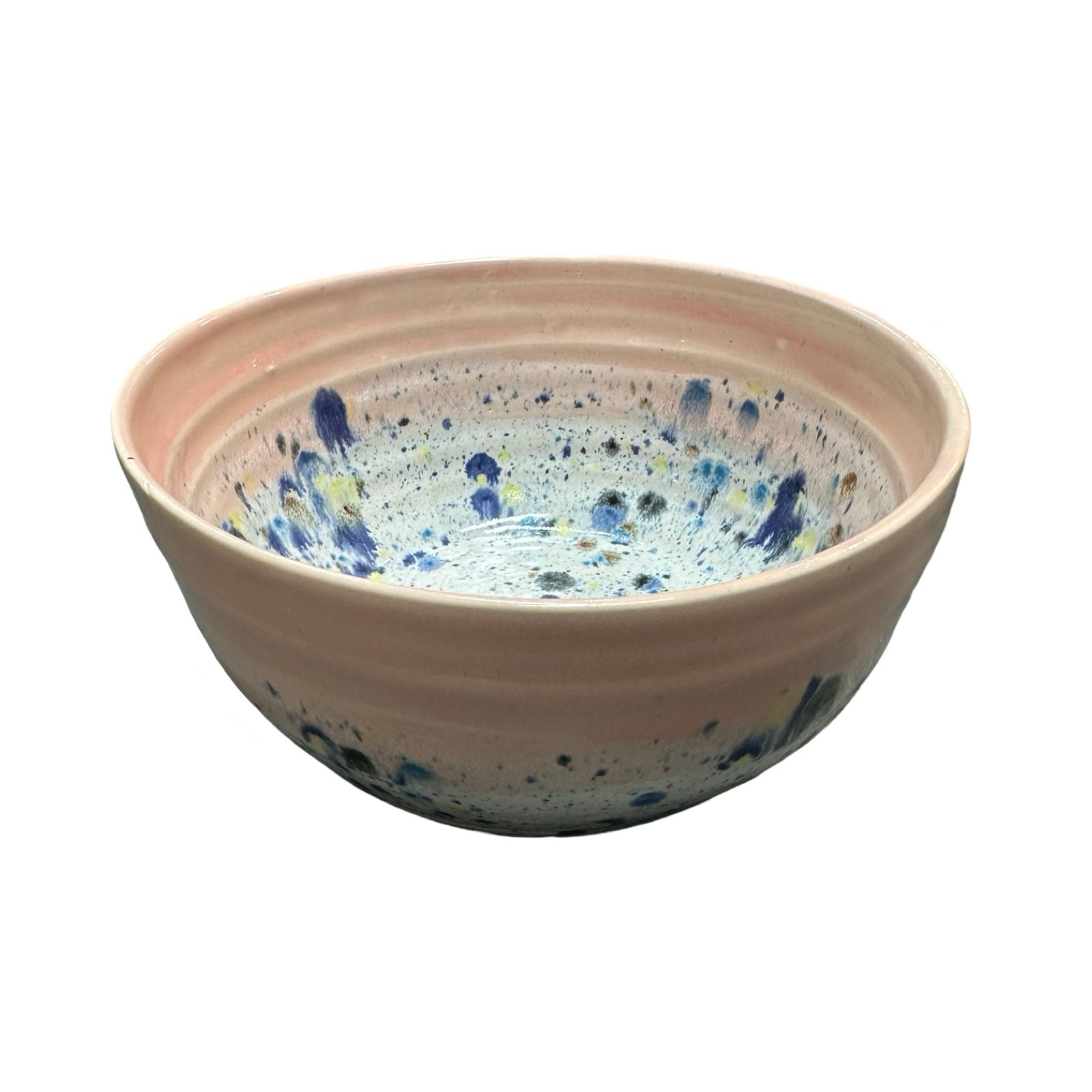 Deep ceramic ramen bowl in pink and white with colour splash design.
