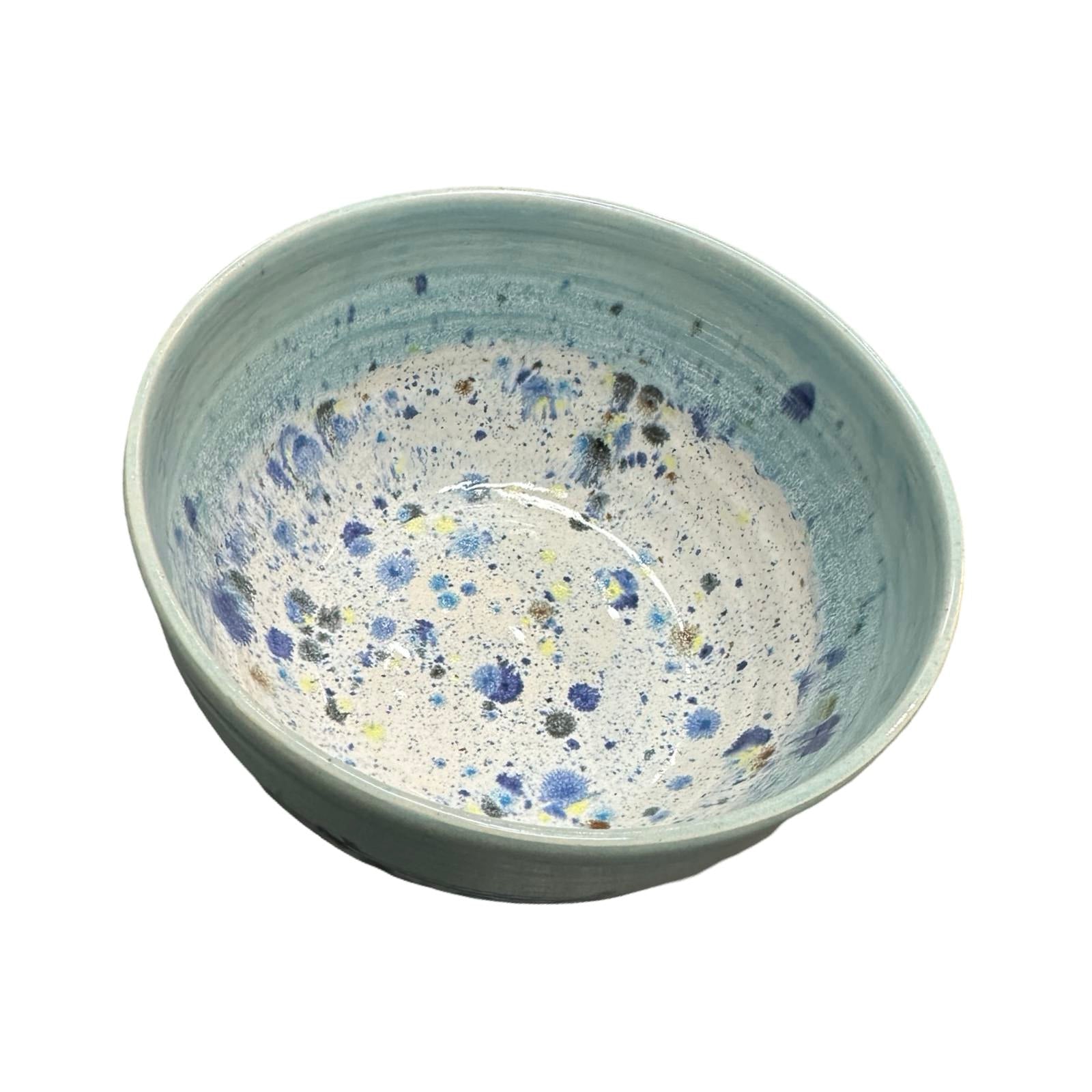 Deep ceramic ramen bowl in turquoise and white with colour splash design.