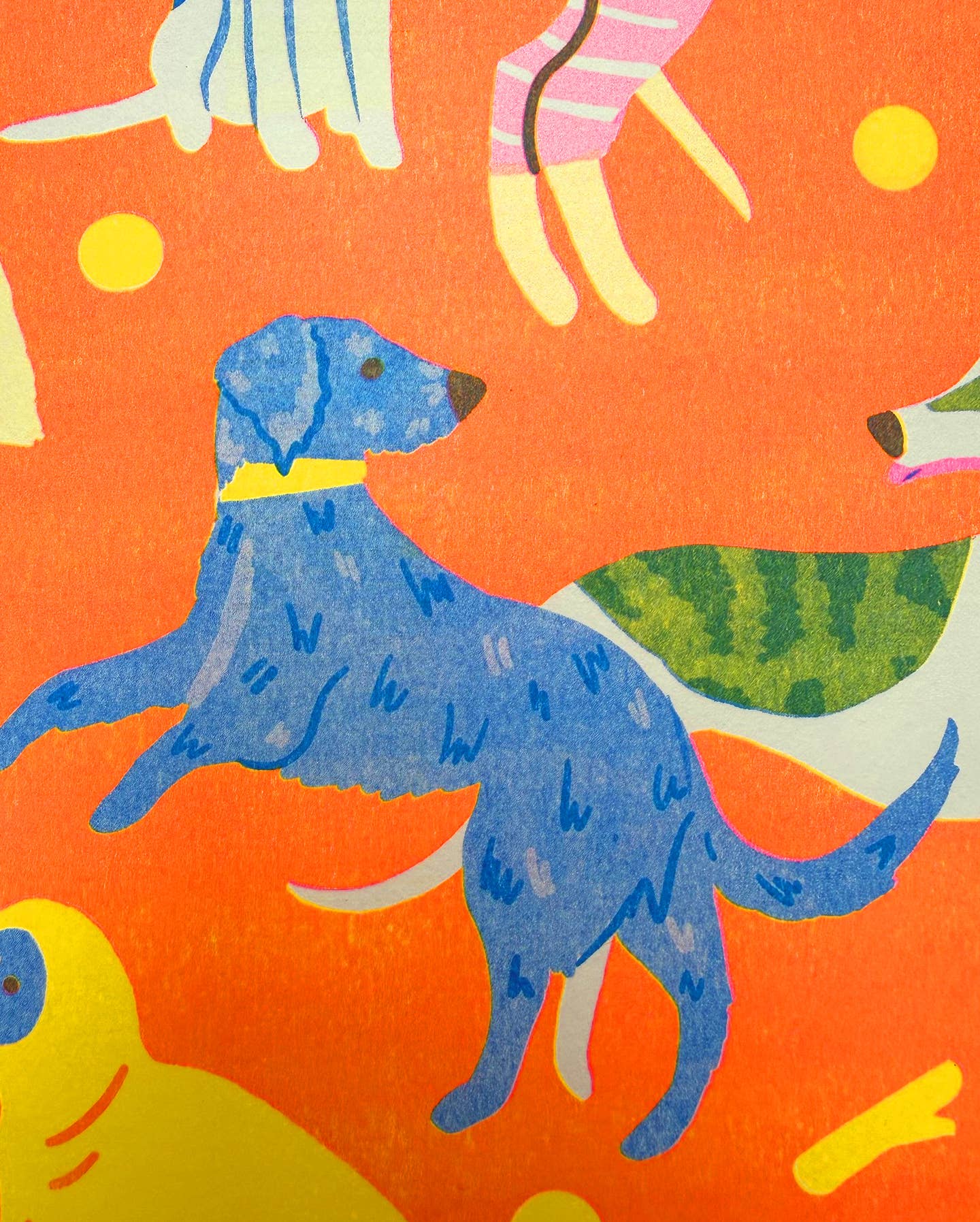 Colourful pattern of dogs on an orange background.
