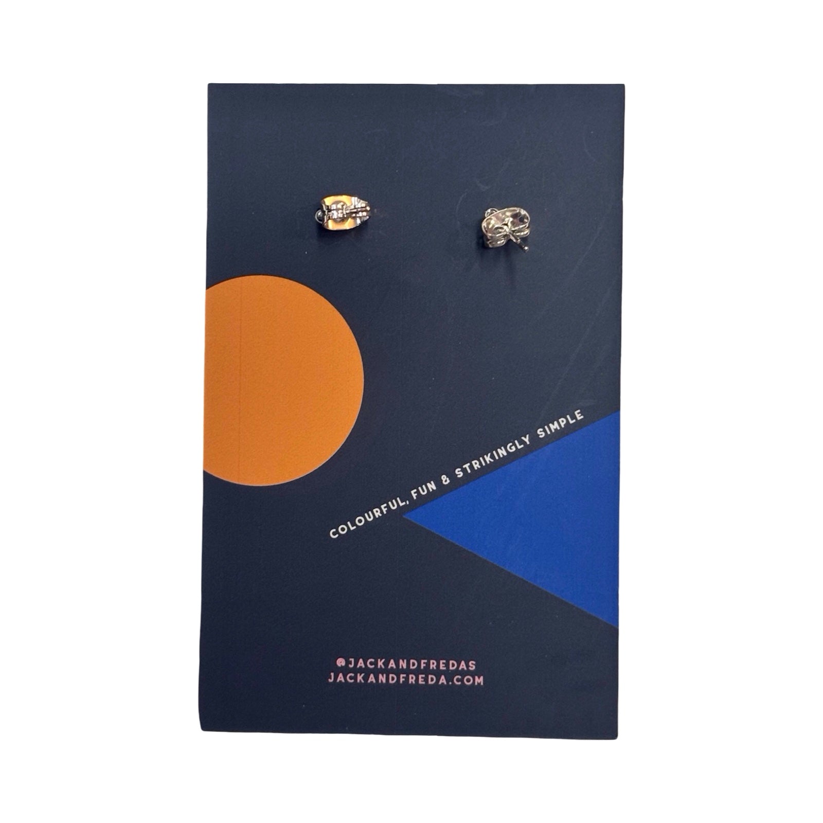 Pair of earrings on a card with geometric design.