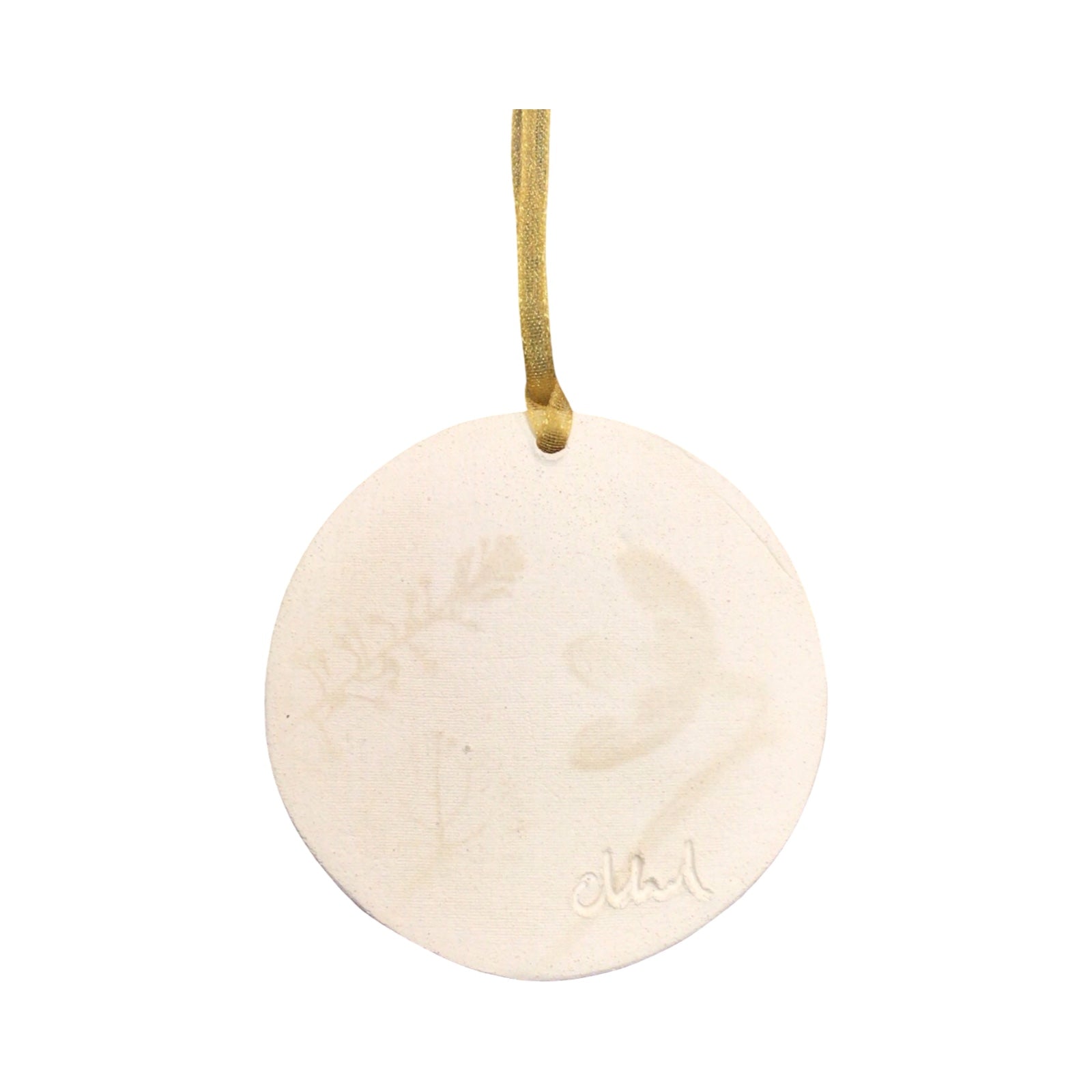 Round beige ornament with a gold string on a white background