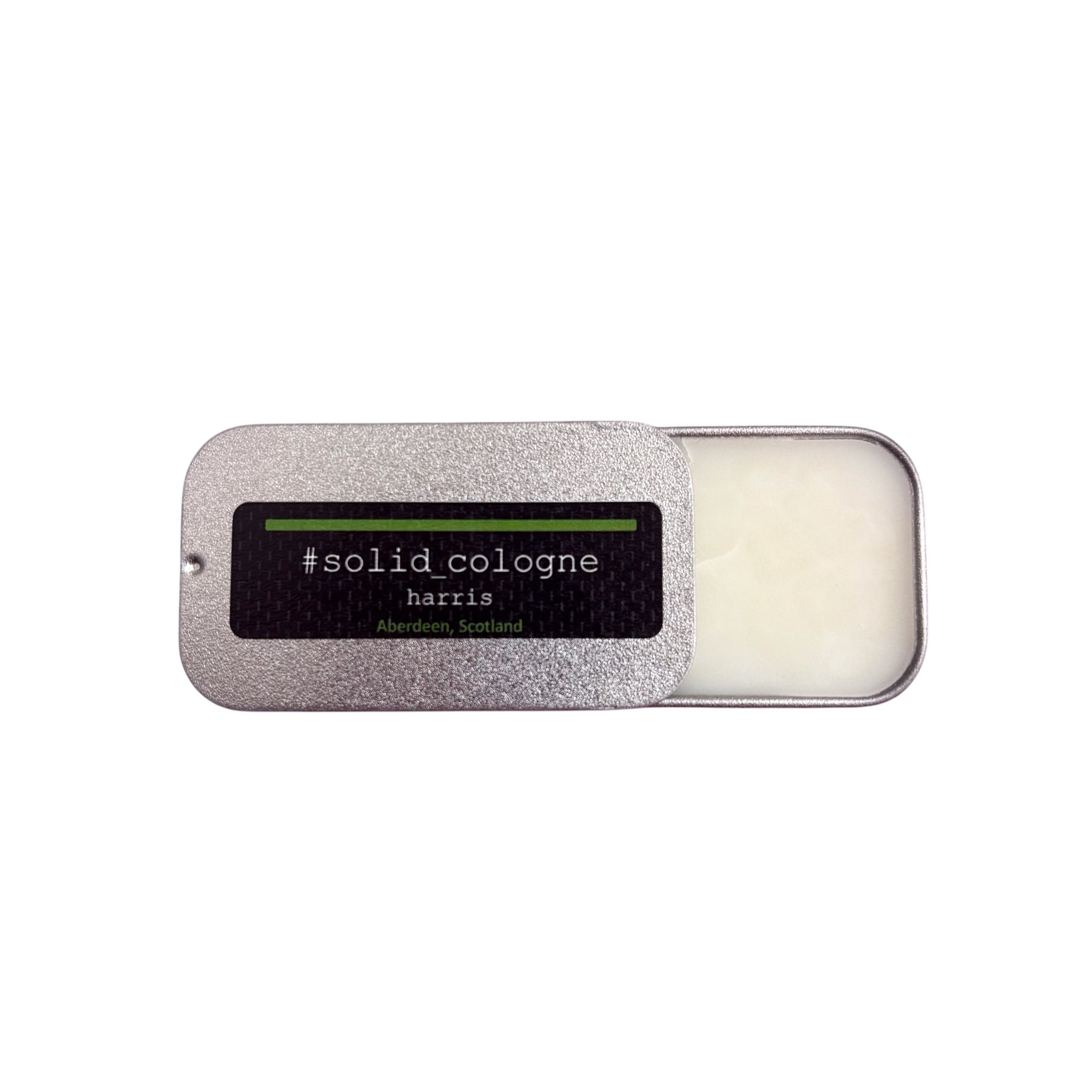 Small silver tin of 'Harris' scented solid cologne, half open.