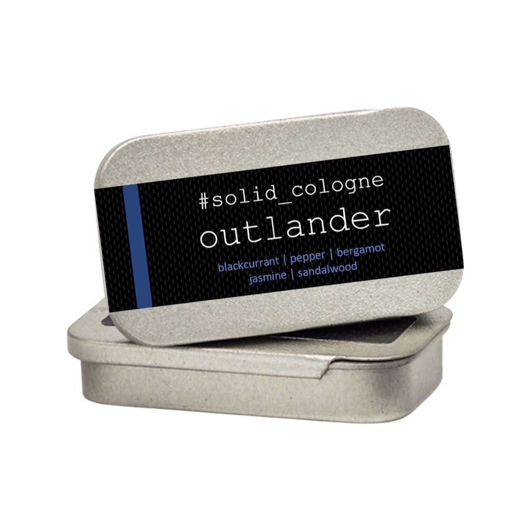 Small silver tin of 'outlander' scented solid cologne.