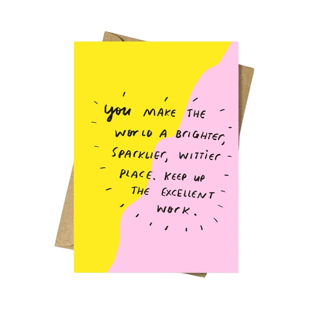 A sparkling place card with yellow, pink, and black design, featuring the text 'You make the world a brighter, sparklier, wittier place. Keep Up The Excellent Work.