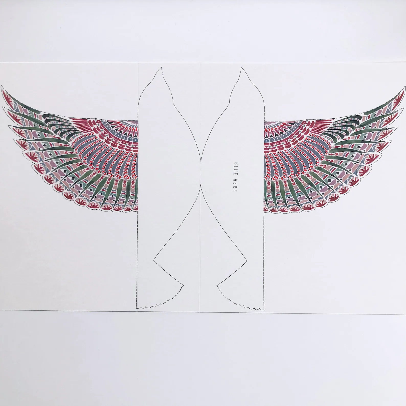 Design of a bird with decorative wings on a white background.