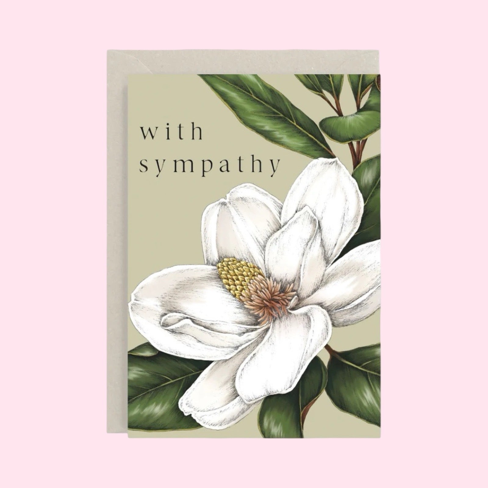Sympathy card with a white flower illustration on a light green background, with an envelope and a light pink background.