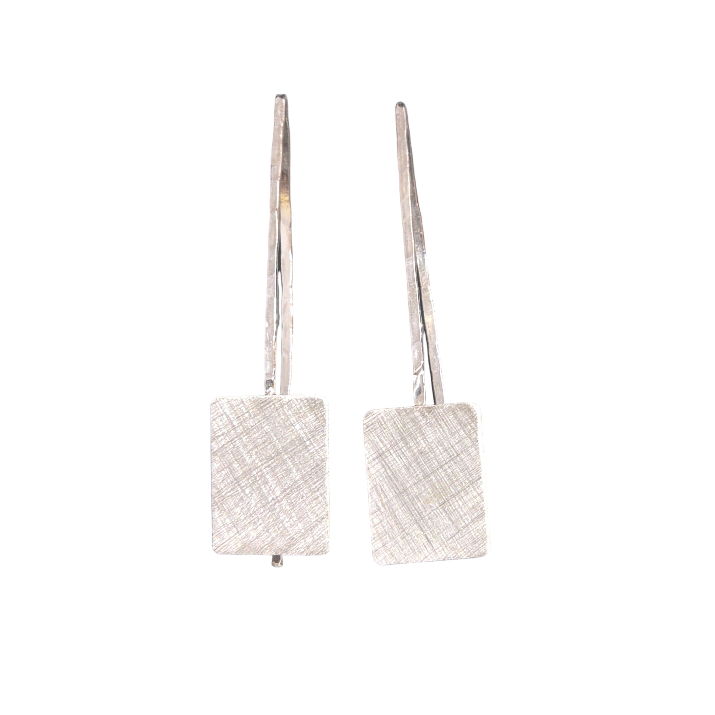 Handcrafted recycled sterling silver earrings. The silver squares have a matte brushed finish and the stem has been lightly hammered.